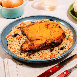 Sobrecoxa no mel e mostarda com couscous marroquino