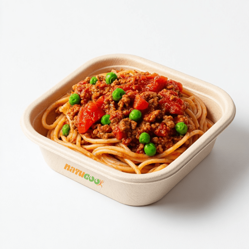 Espaguete integral à bolonhesa, carne moída de Patinho com molho de tomate natural , tomate picado e ervilhas